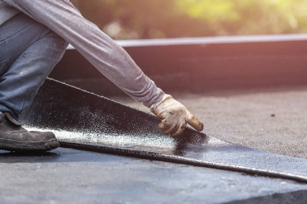 Professional Waterproofing technician working in Milford, MI